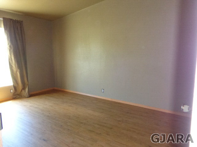 3551 E Road Palisade, CO 81526 - Photo 7 of 8 a view of an empty room and window