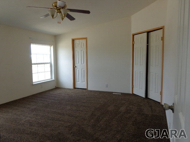 3551 E Road Palisade, CO 81526 - Photo 8 of 8 a view of an empty room with a window