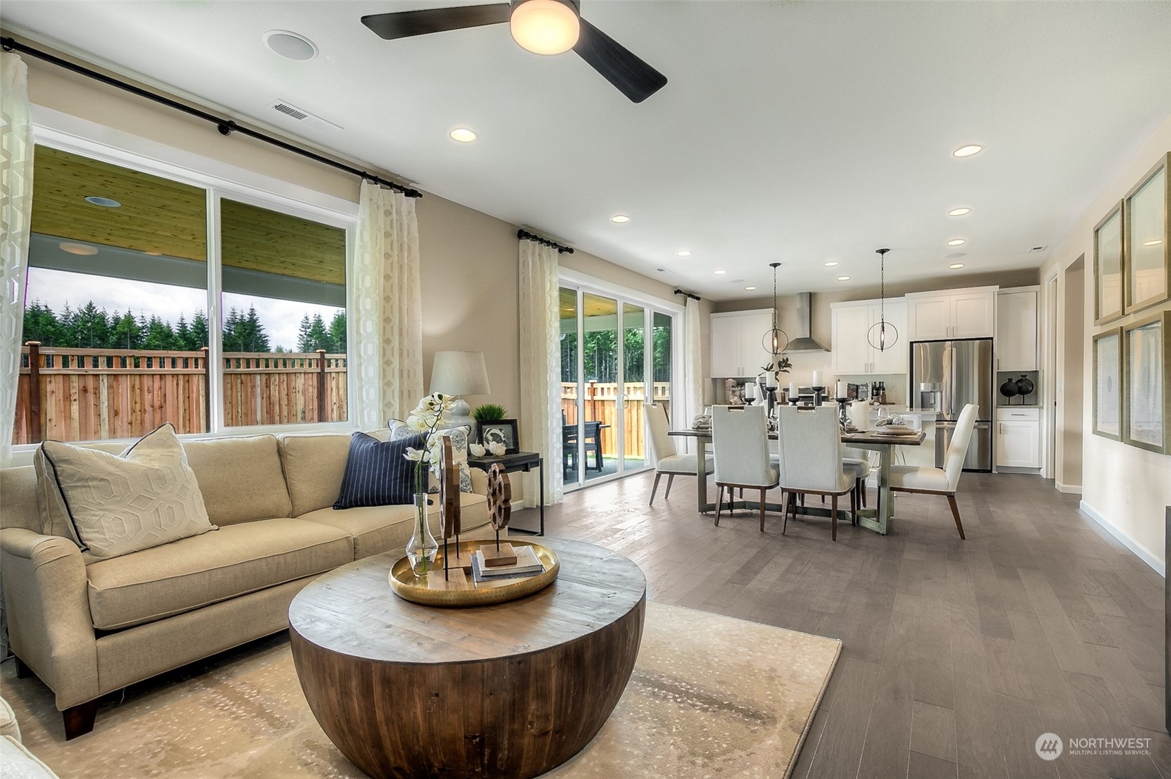 10304 Balto Road Northwest, Unit 37 Silverdale, WA 98383 - Photo 13 of 21 a living room with furniture kitchen and a large window