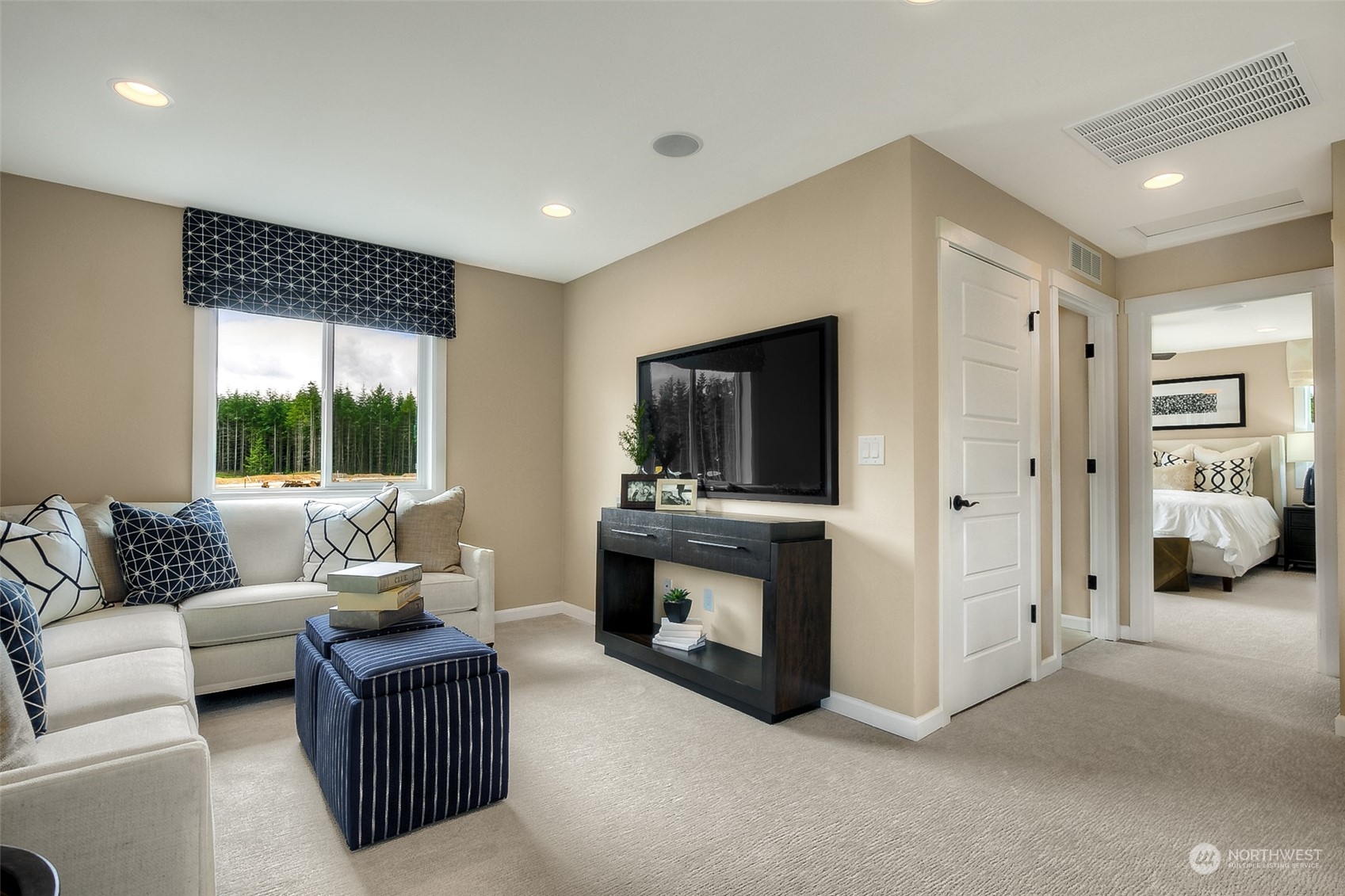 10304 Balto Road Northwest, Unit 37 Silverdale, WA 98383 - Photo 14 of 21 a living room with furniture and a fireplace