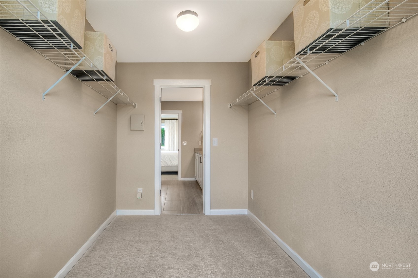 10304 Balto Road Northwest, Unit 37 Silverdale, WA 98383 - Photo 17 of 21 a view of hallway with walk in closet