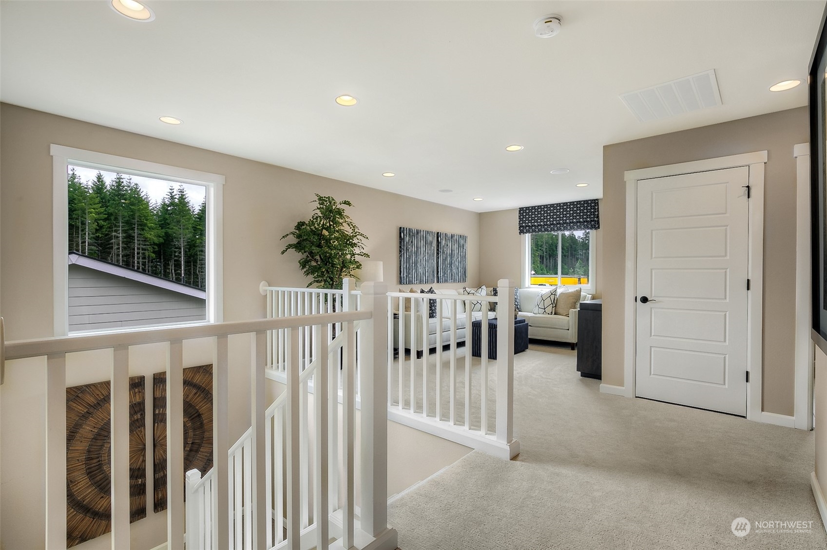 10304 Balto Road Northwest, Unit 37 Silverdale, WA 98383 - Photo 19 of 21 a view of a livingroom with a balcony