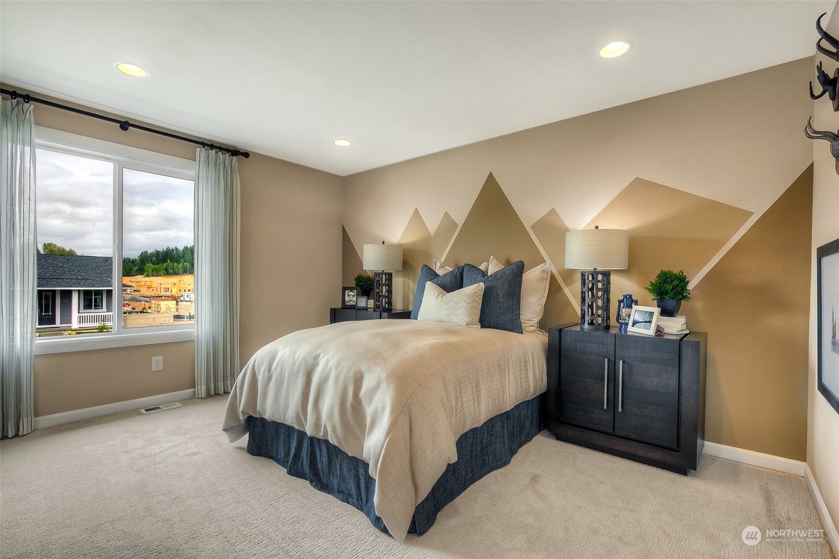 10304 Balto Road Northwest, Unit 37 Silverdale, WA 98383 - Photo 20 of 21 a spacious bedroom with a bed and window