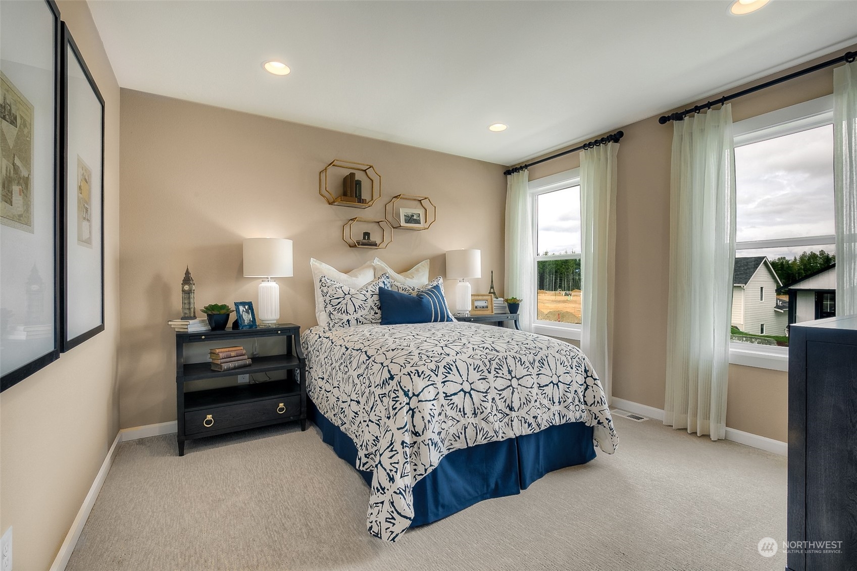 10304 Balto Road Northwest, Unit 37 Silverdale, WA 98383 - Photo 21 of 21 a bedroom with a bed and a cabinets