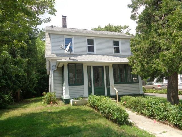 315 Frost Road Waterbury, CT 06705 - Photo 1 of 1 a front view of a house with a yard