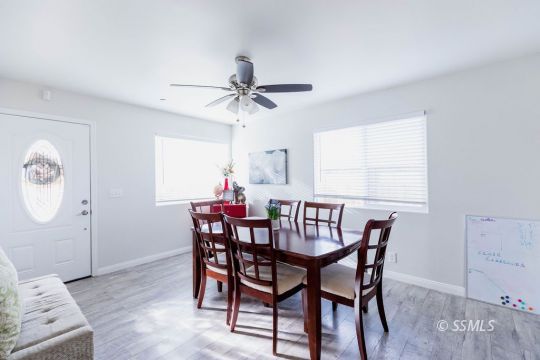 916 South Farragut Street Ridgecrest, CA 93555 - Photo 5 of 30 a view of a dining room with furniture and window