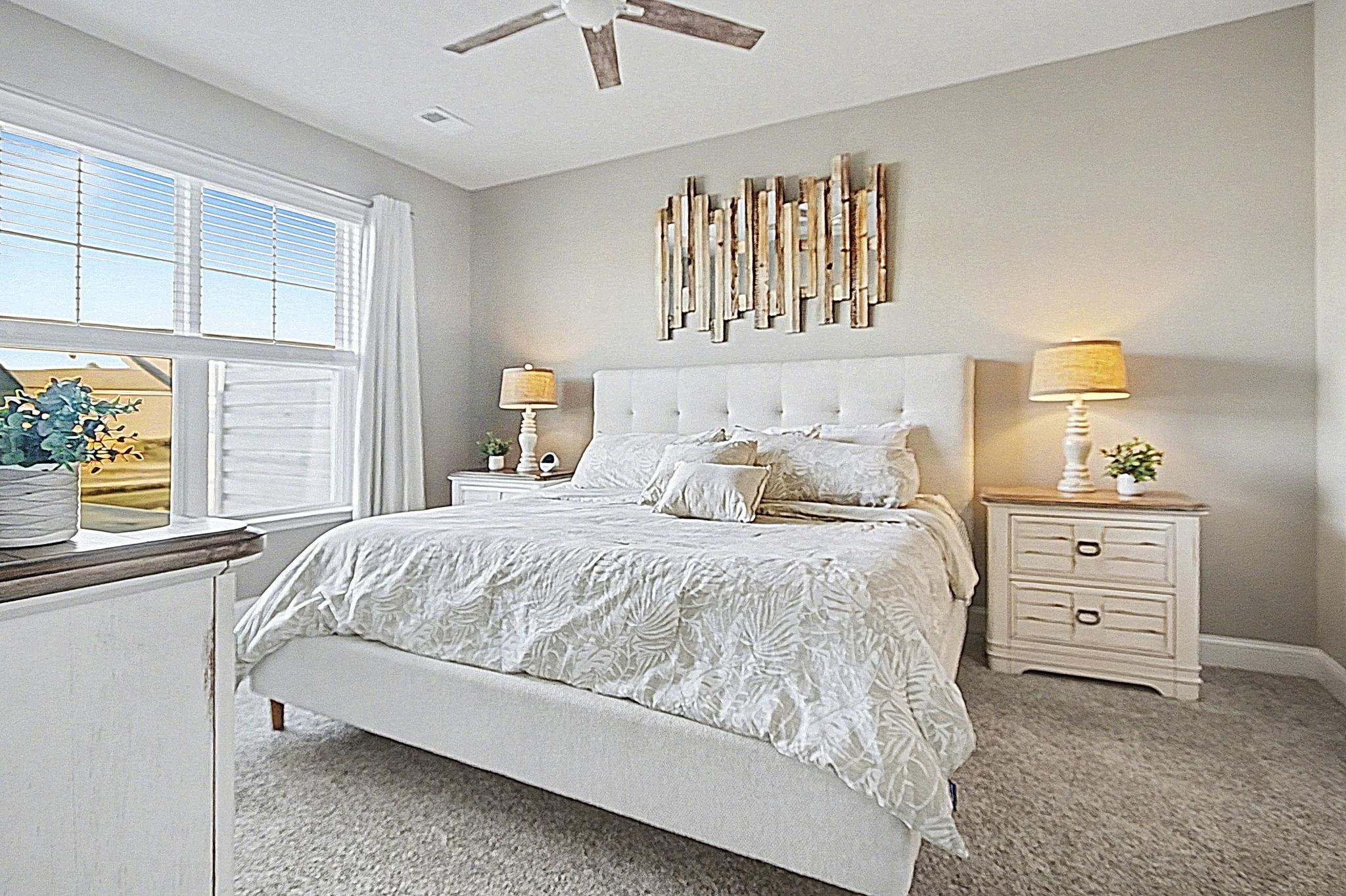 5830 Cremona Drive Myrtle Beach, SC 29577 - Photo 20 of 39 Bedroom featuring carpet floors and a ceiling fan