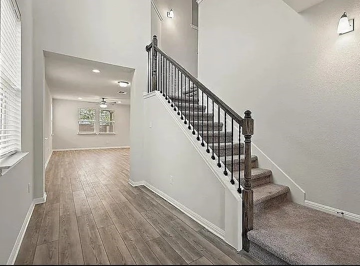 10801 Sentinel Drive Austin, TX 78747 - Photo 2 of 23 a view of entryway with wooden floor