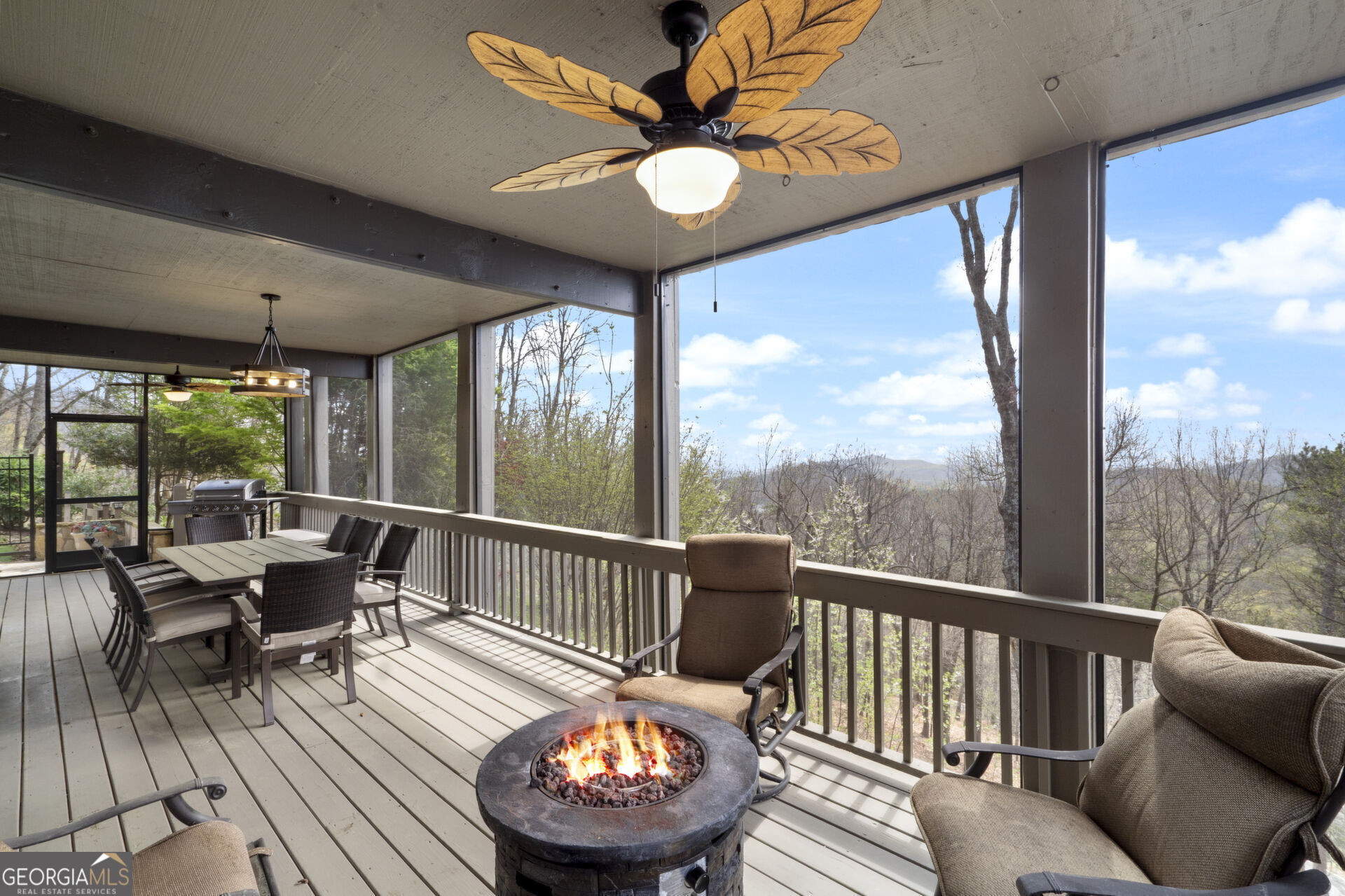 1545 Dawson Petit Rdg Drive Big Canoe, GA 30143 - Photo 27 of 36 a view of a dining room with furniture window and outside view