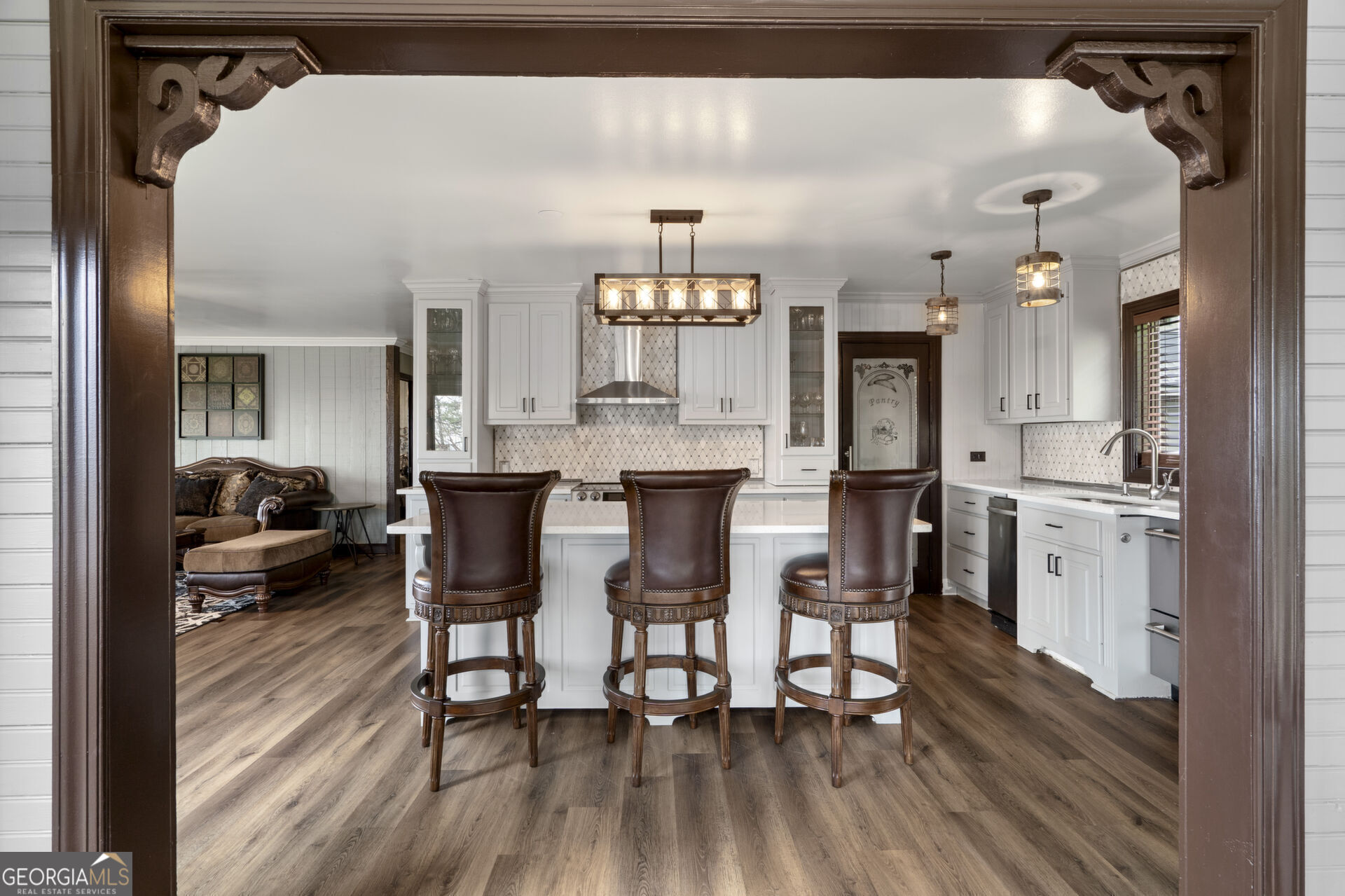 1545 Dawson Petit Rdg Drive Big Canoe, GA 30143 - Photo 5 of 36 a view of a dining room with furniture and wooden floor