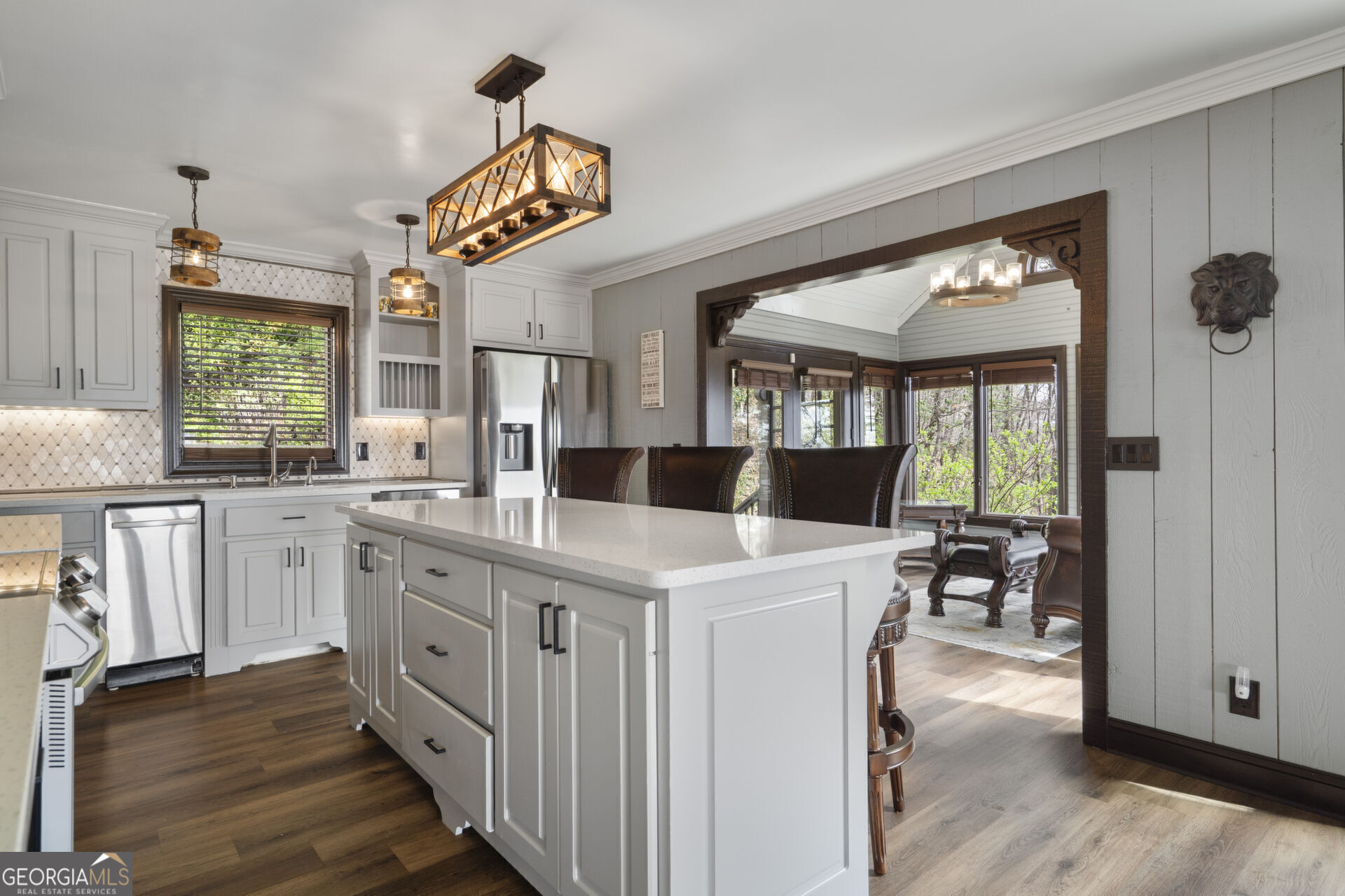 1545 Dawson Petit Rdg Drive Big Canoe, GA 30143 - Photo 9 of 36 a kitchen with kitchen island a large counter top space appliances and a window