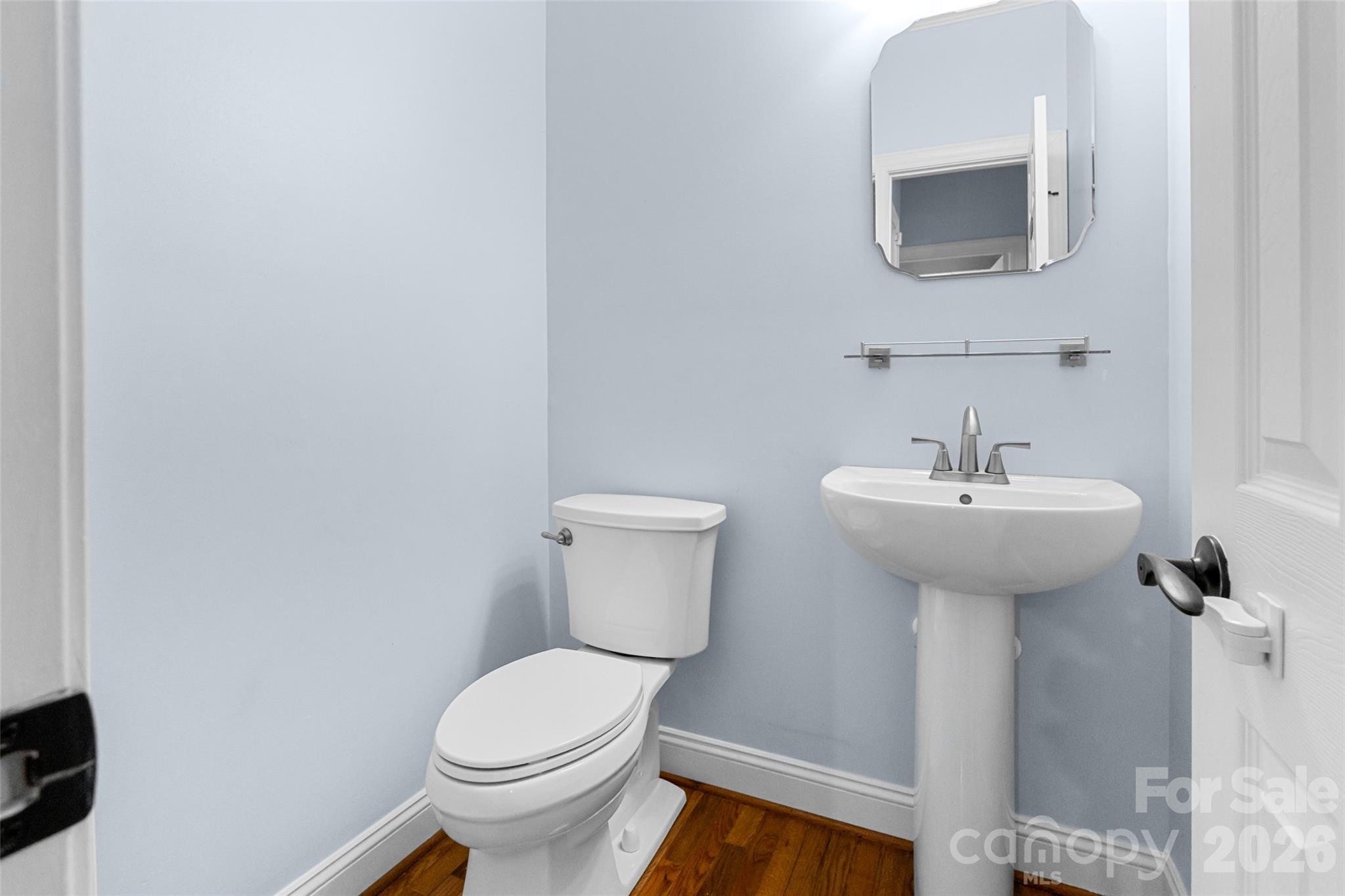 321 Forbes Court Clover, SC 29710 - Photo 18 of 31 a bathroom with a sink toilet and mirror