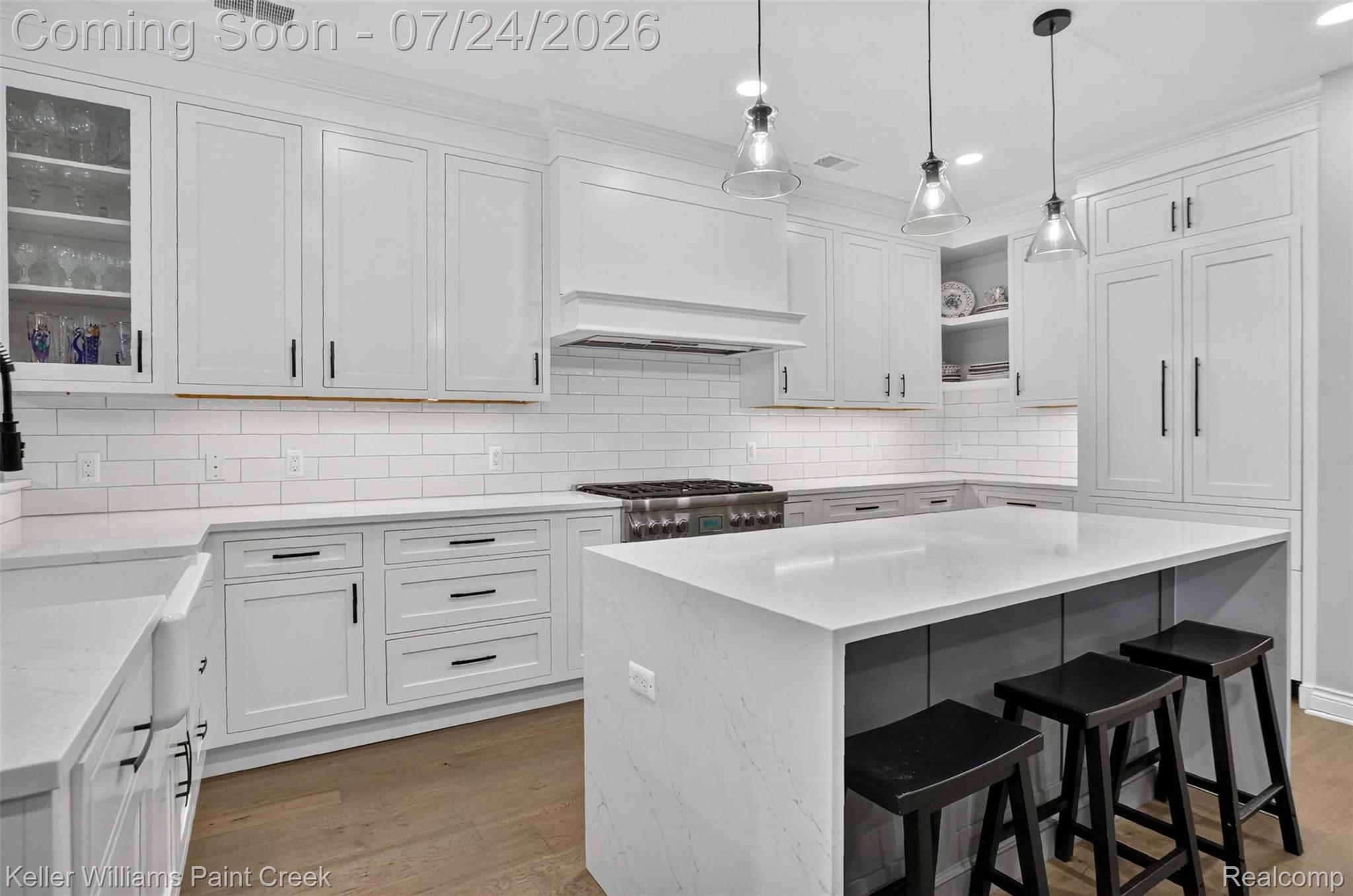 1221 North Main Street Rochester, MI 48307 - Photo 10 of 37 The Island has a quartz counter with waterfall finish on both ends