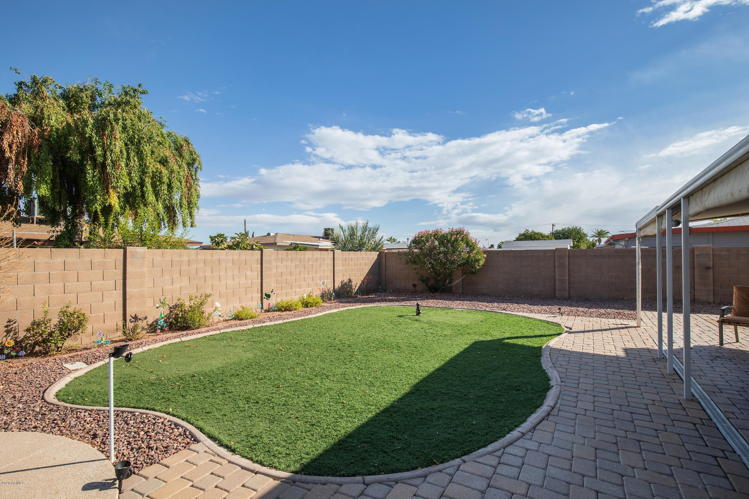 5320 East Decatur Street Mesa, AZ 85205 - Photo 28 of 34 a view of a backyard with sitting area