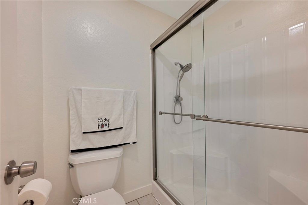 598 Elkwood Court Brea, CA 92821 - Photo 22 of 32 a bathroom with a toilet sink and shower