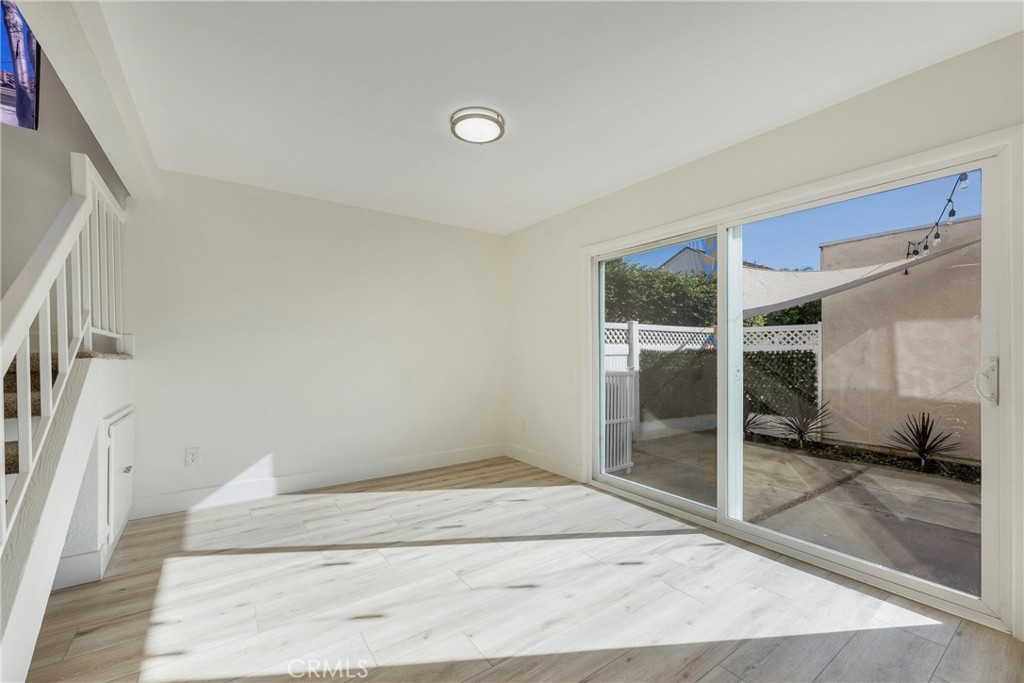 598 Elkwood Court Brea, CA 92821 - Photo 8 of 32 a view of a livingroom with wooden floor and a large window