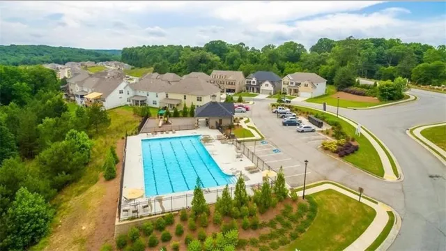 a view of a swimming pool with a patio