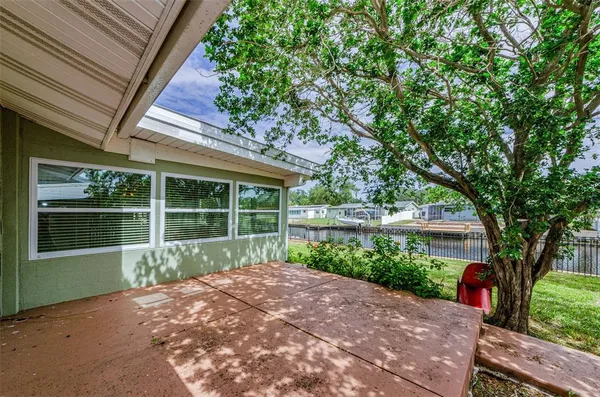 a house view with a garden space