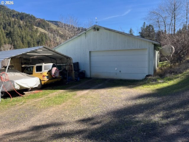 59099 Upper Imnaha Road Imnaha, OR 97842 - Photo 18 of 18 a view of a house with a yard