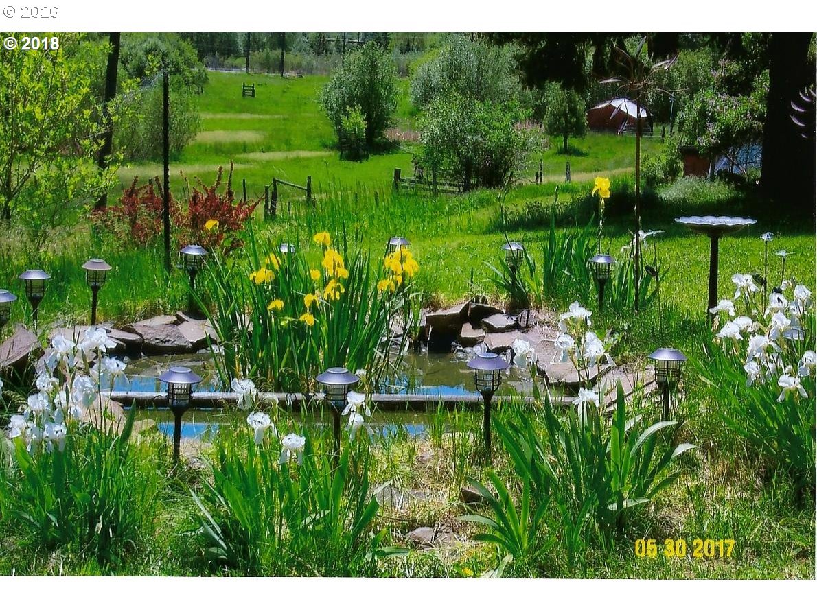 59099 Upper Imnaha Road Imnaha, OR 97842 - Photo 7 of 18 a garden view with a lake view