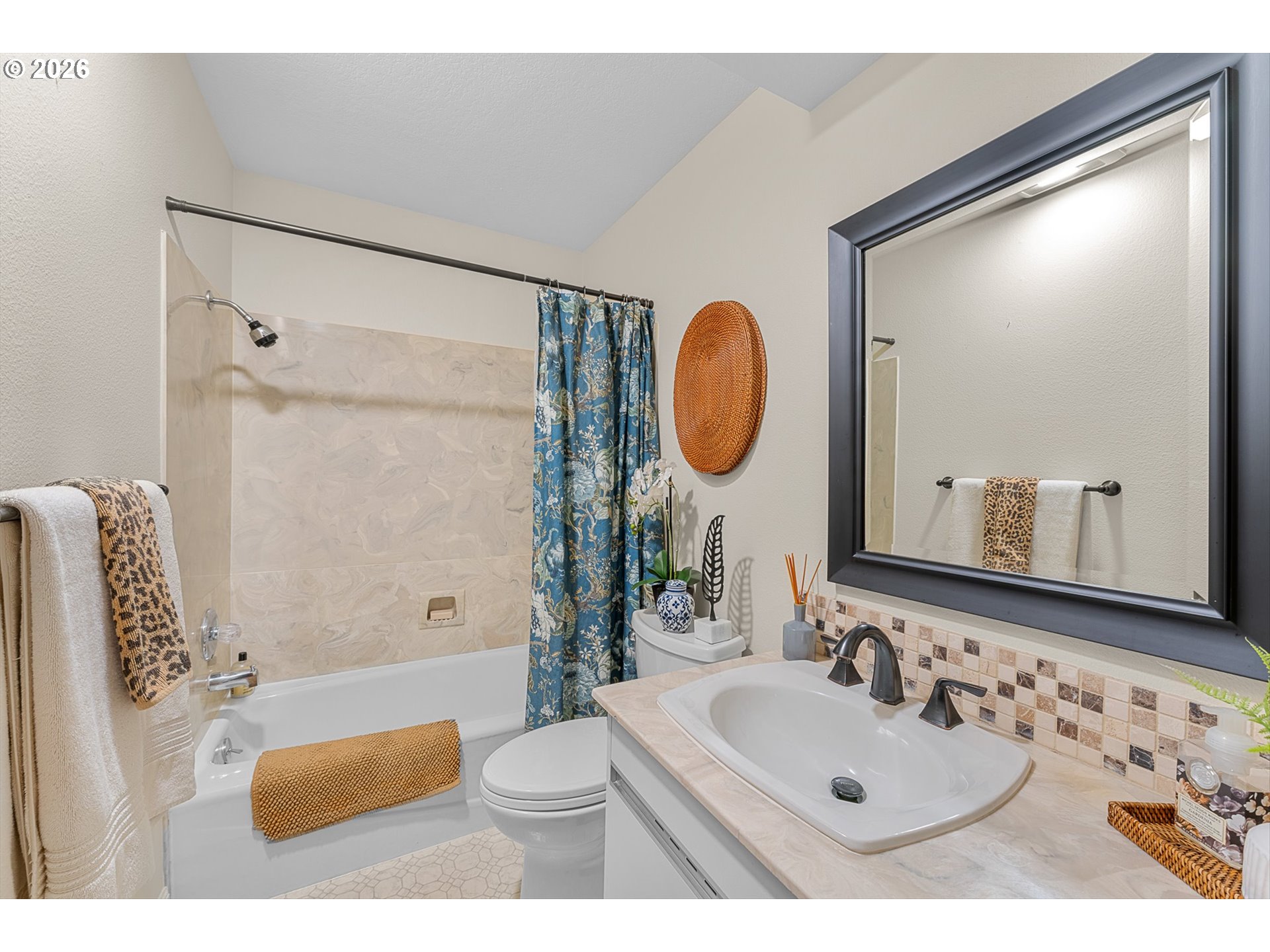 77 Condolea Way Lake Oswego, OR 97035 - Photo 15 of 25 a bathroom with a sink a toilet and a mirror