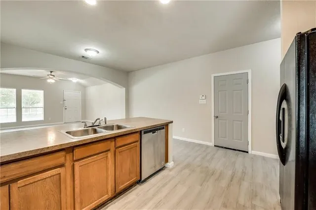 a bathroom with a double vanity sink and mirror