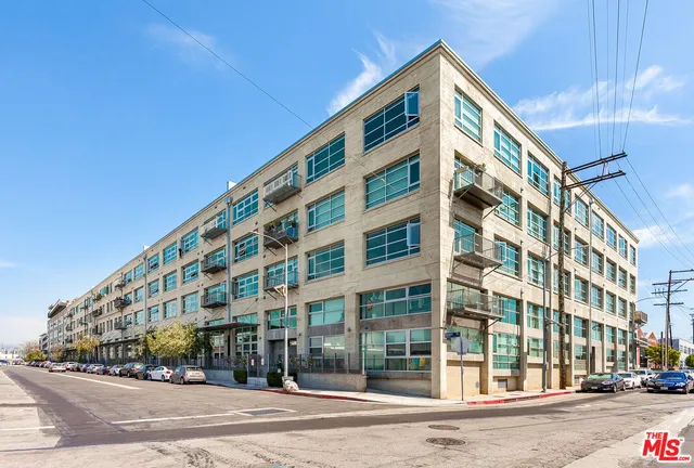 a view of a building and a street