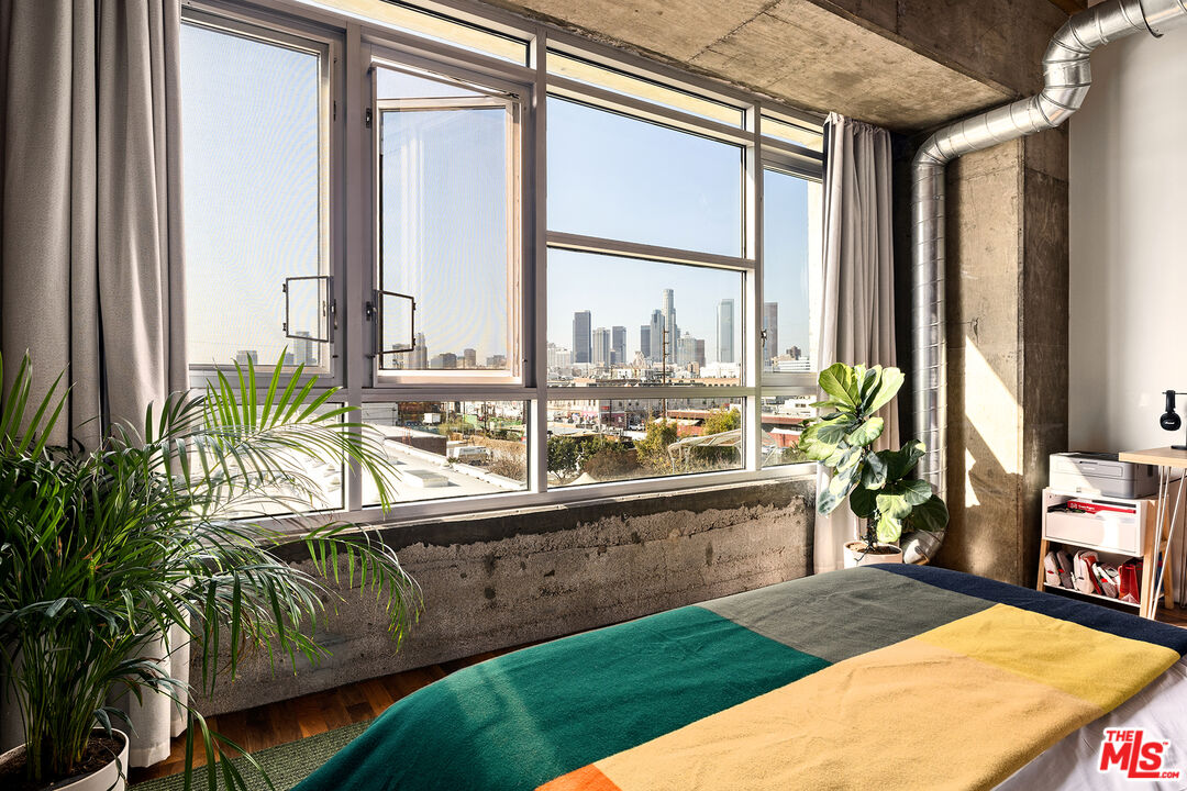 530 South Hewitt Street, Unit 425 Los Angeles, CA 90013 - Photo 4 of 22 a view of swimming pool with chairs