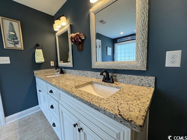 1896 Bud Graham Road Galivants Ferry, SC 29544 - Photo 18 of 36 Bathroom featuring tile patterned floors and doubl
