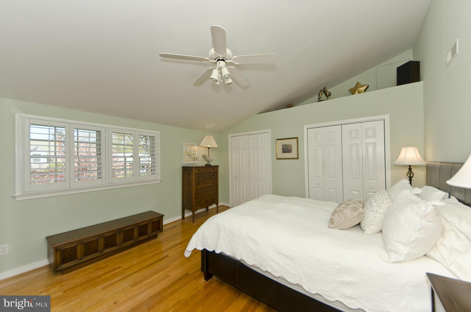 5700 25th Road North Arlington, VA 22207 - Photo 14 of 29 a bedroom with a bed and wooden floor