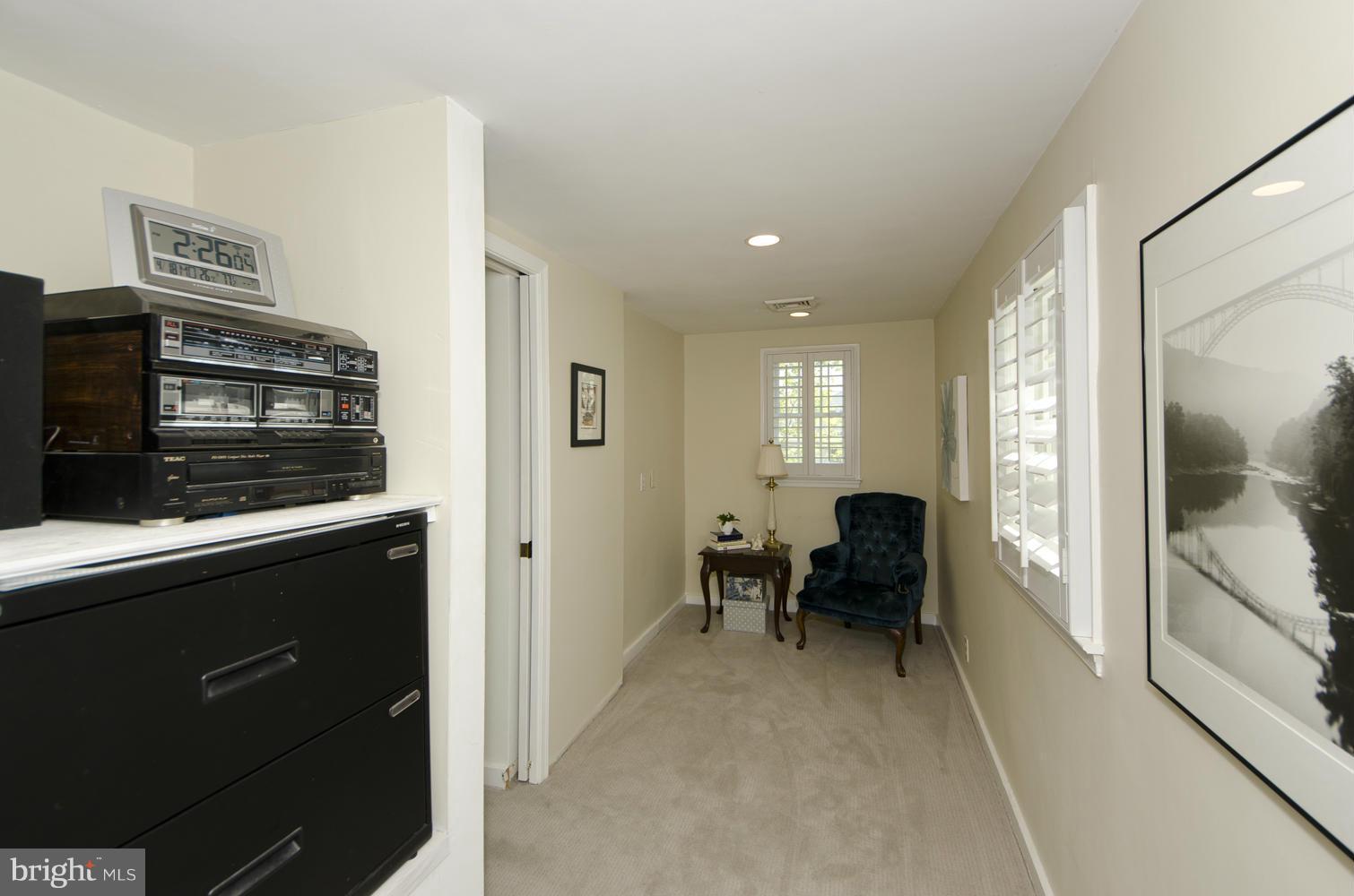 5700 25th Road North Arlington, VA 22207 - Photo 16 of 29 a living room with furniture and a window