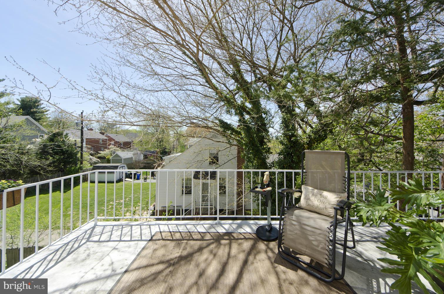 5700 25th Road North Arlington, VA 22207 - Photo 17 of 29 a view of a balcony with two chairs and a table