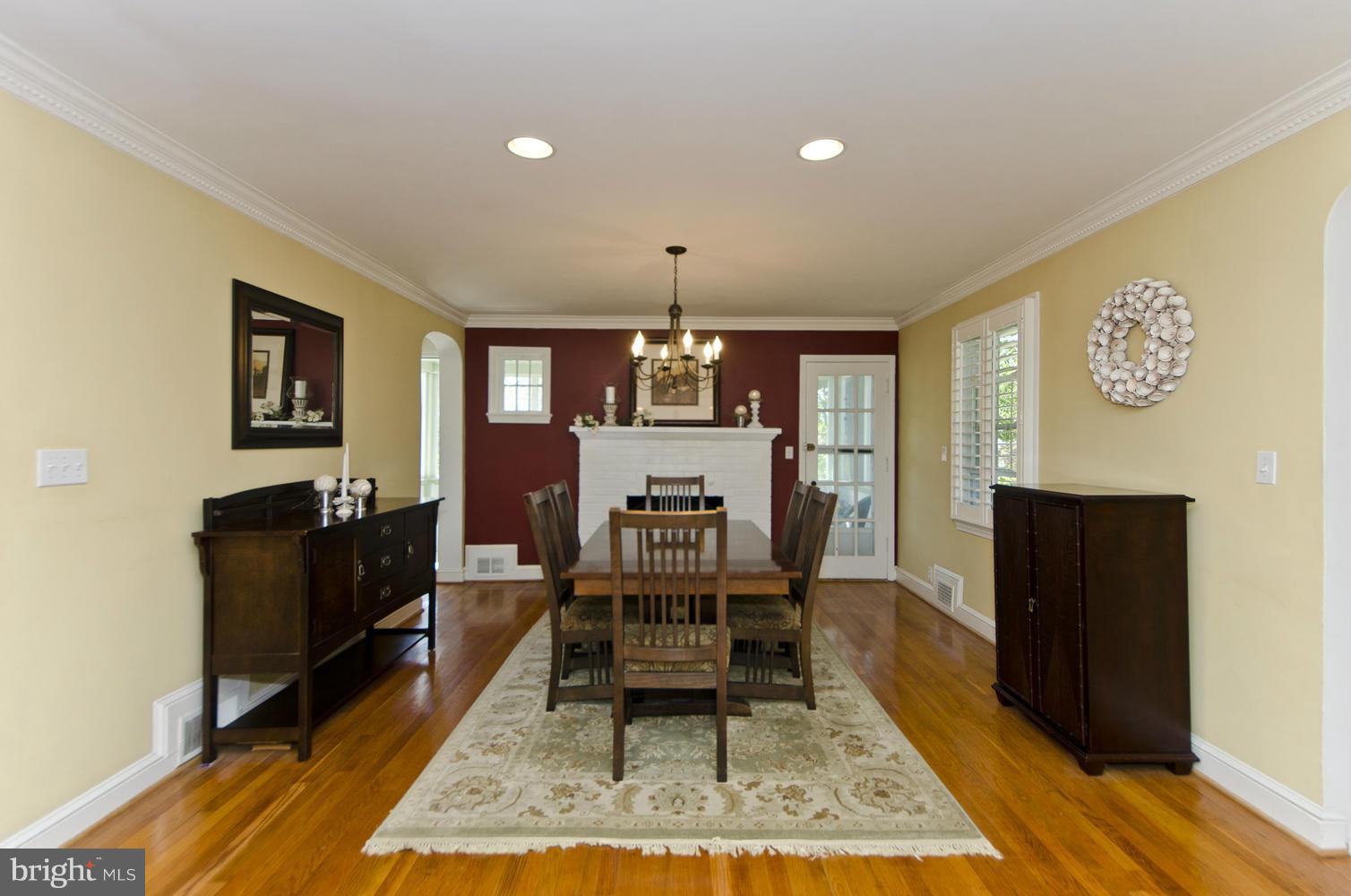 5700 25th Road North Arlington, VA 22207 - Photo 4 of 29 a living room with furniture a rug and a table