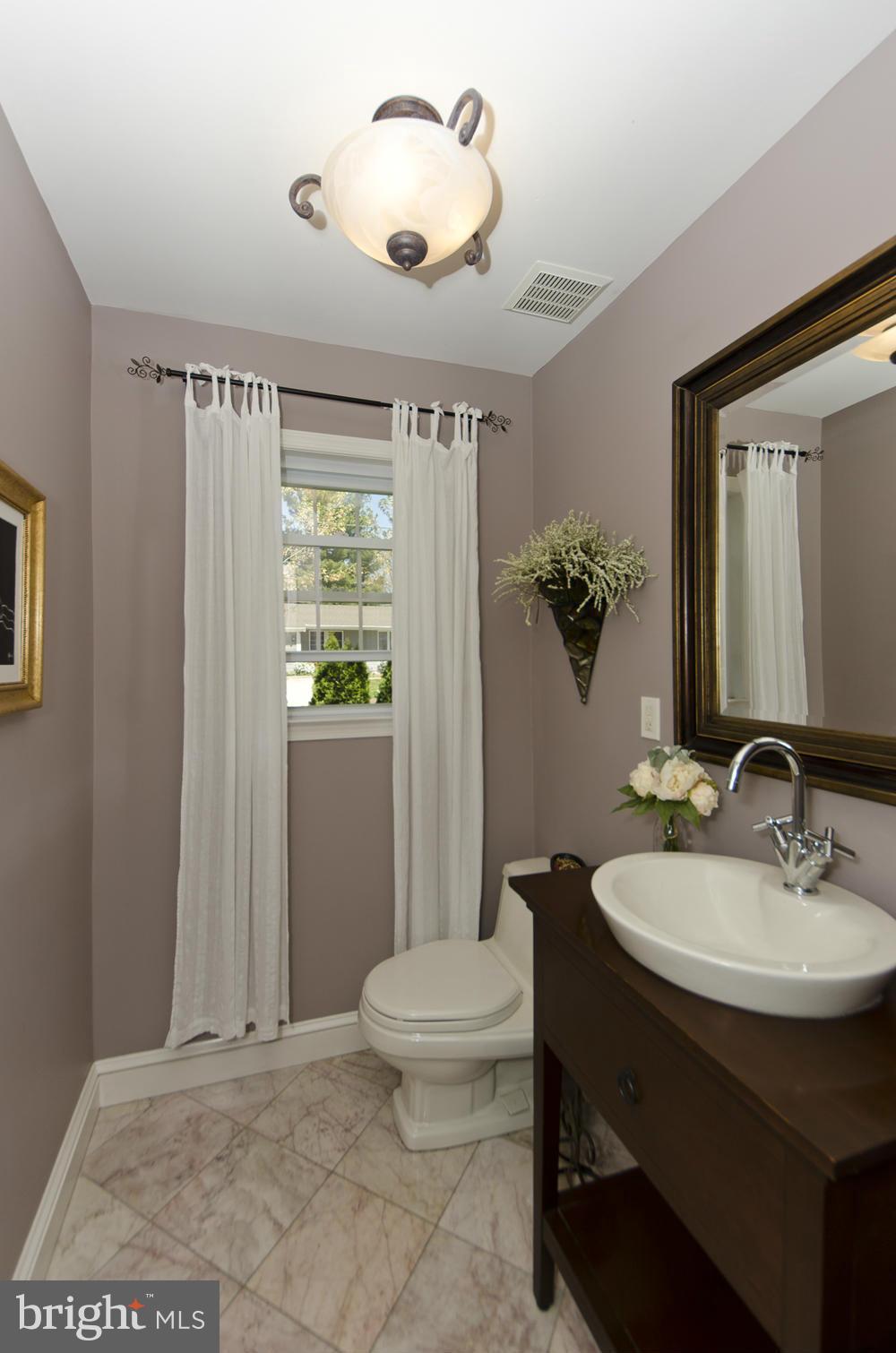 5700 25th Road North Arlington, VA 22207 - Photo 9 of 29 a bathroom with a sink toilet and shower