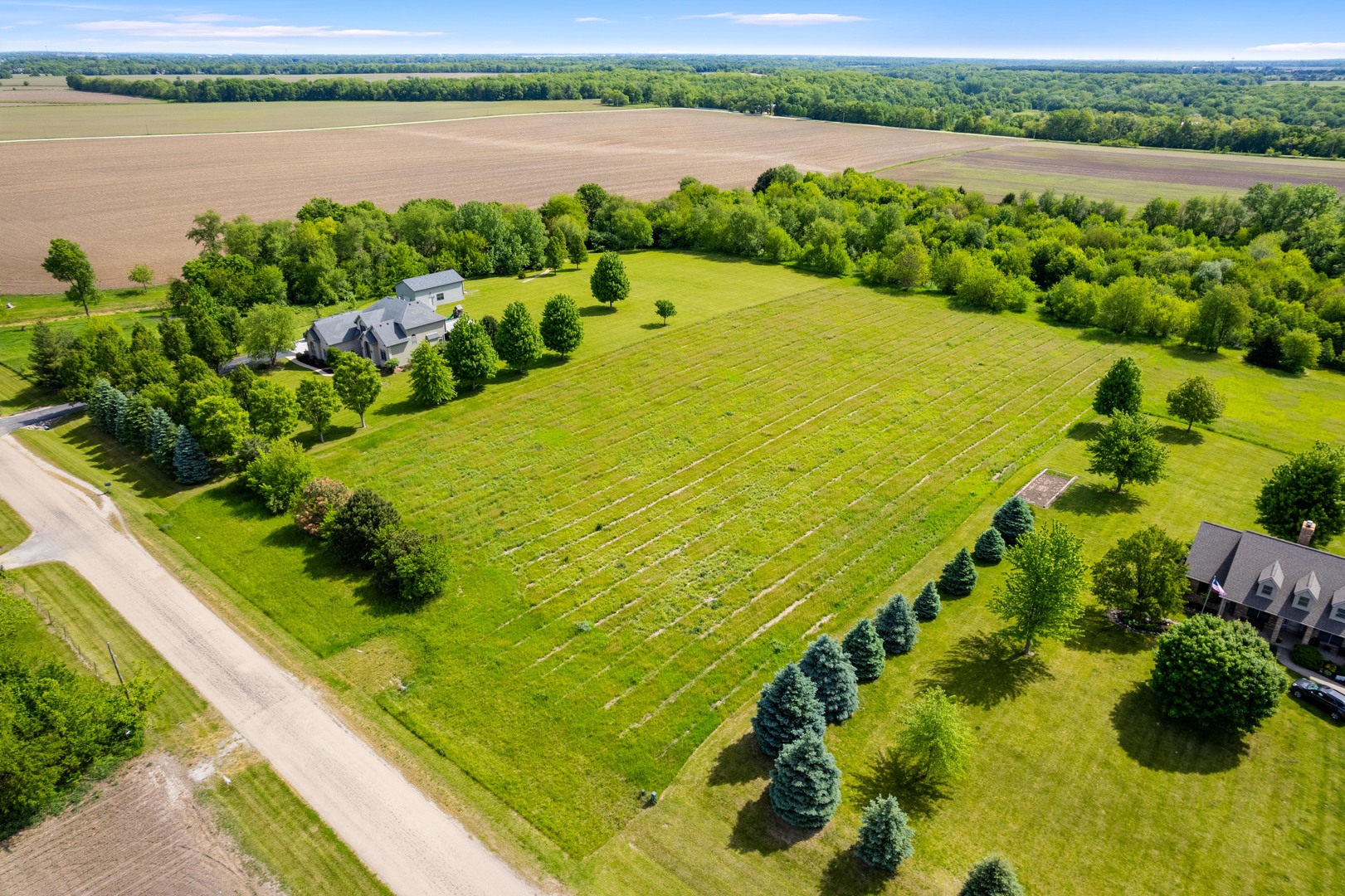 Lot 2 Oakbrook Road Newark, IL 60541 - Photo 2 of 11 a view of a lake with a city view