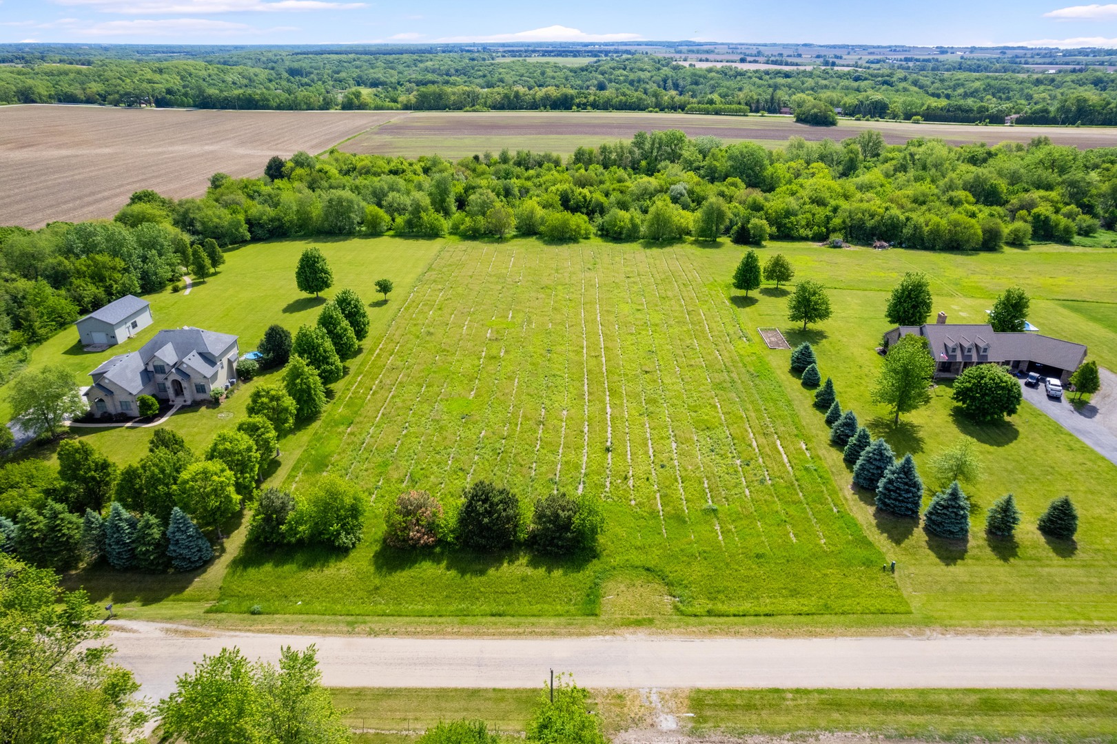 Lot 2 Oakbrook Road Newark, IL 60541 - Photo 3 of 11 an aerial view of a residential houses with outdoor space and river