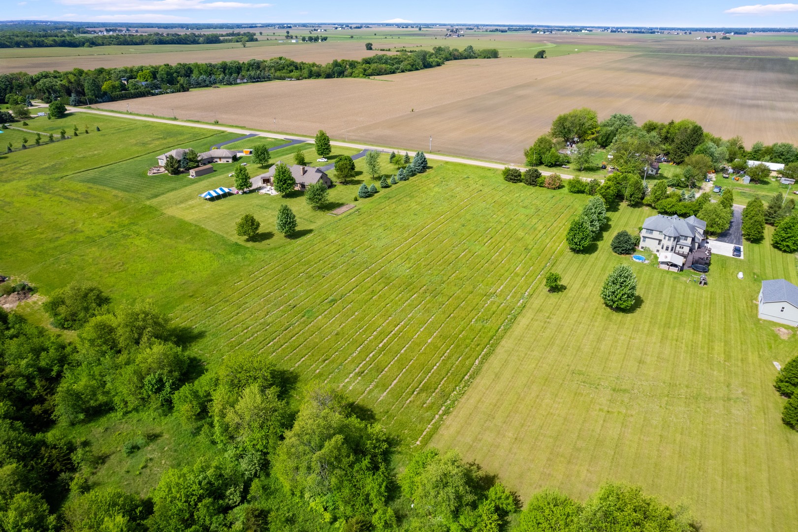 Lot 2 Oakbrook Road Newark, IL 60541 - Photo 6 of 11 a view of a lake with a big yard