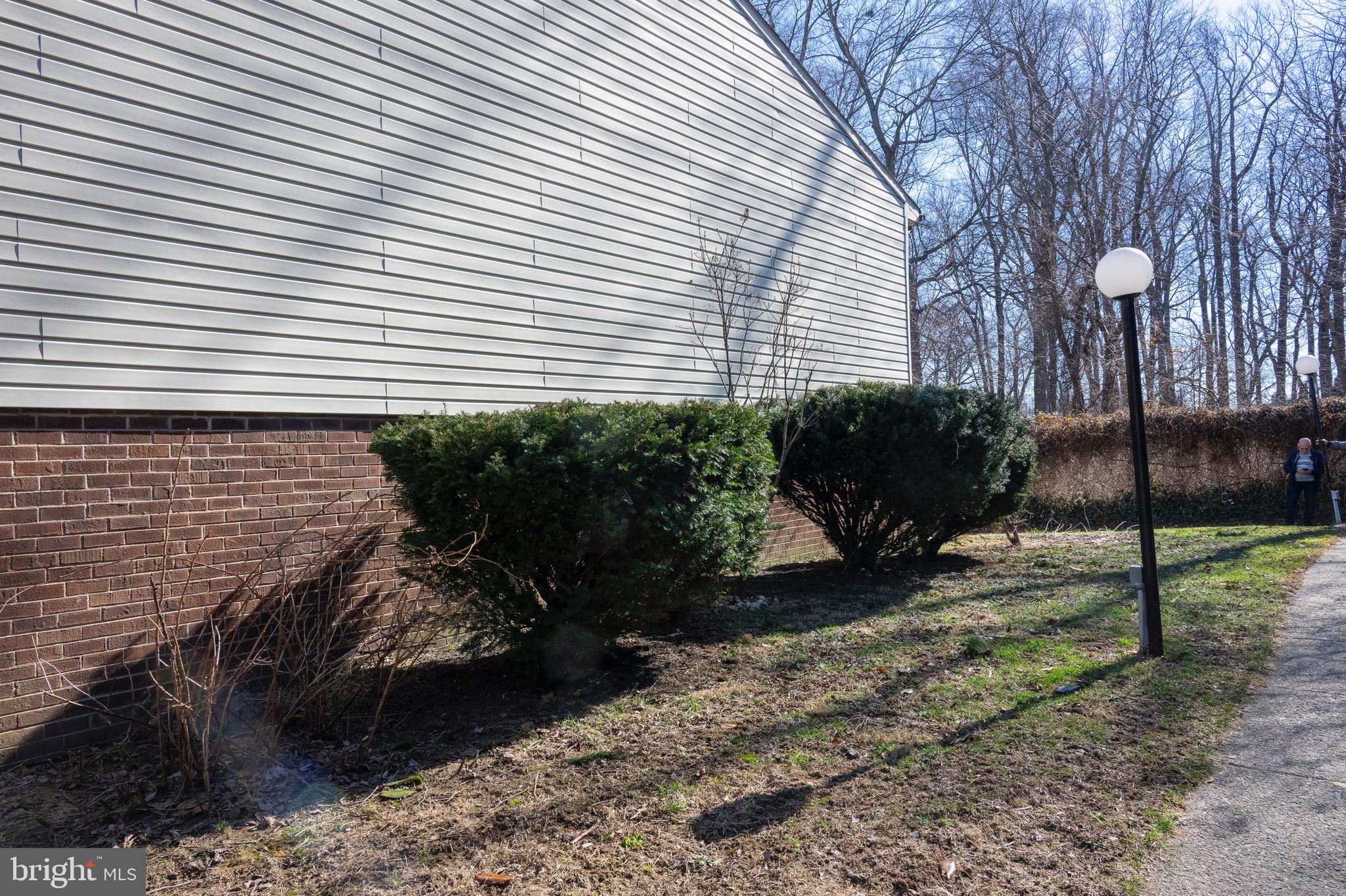 2201 Strahle Street, Unit D3 Philadelphia, PA 19152 - Photo 21 of 21 a front view of a house with garden