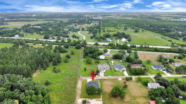 a view of city and green space