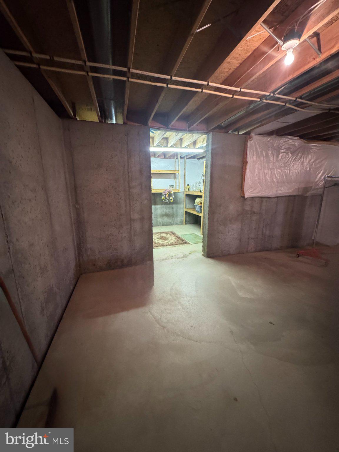 231 Foxglove Loop Bear, DE 19701 - Photo 24 of 30 a view of an empty room with a storage