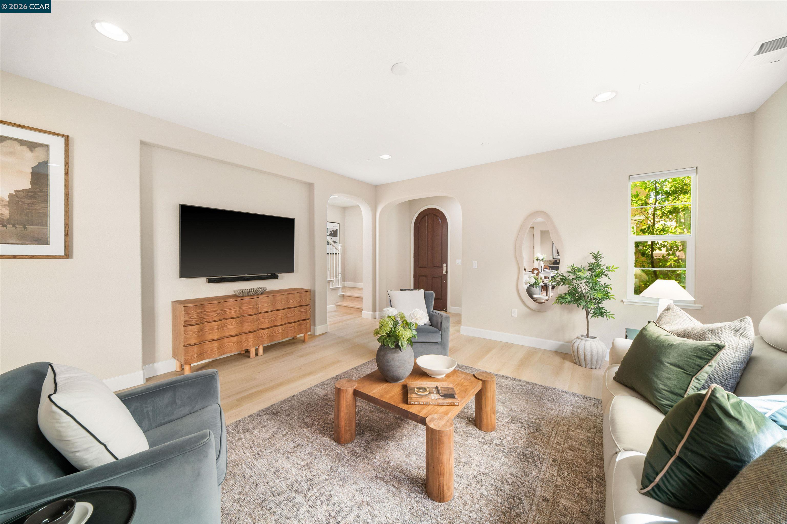 2026 Poinsettia Street San Ramon, CA 94582 - Photo 4 of 26 a living room with furniture wooden floor and a flat screen tv