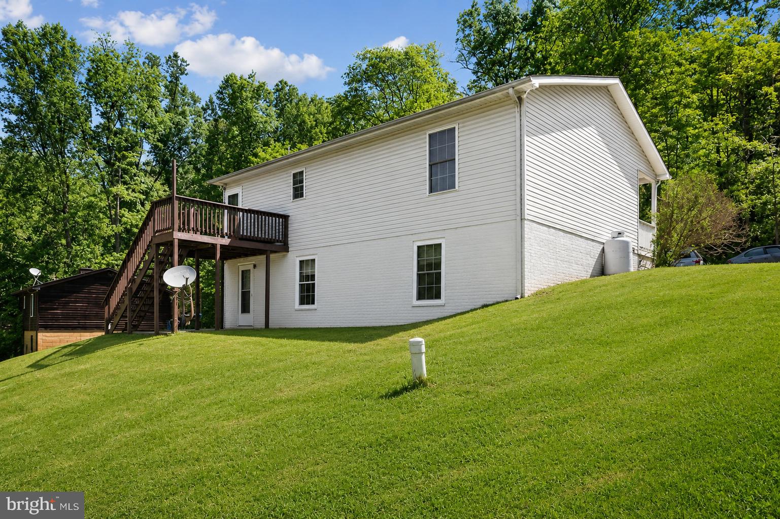 407 Freeze Road Linden, VA 22642 - Photo 15 of 21 Charming hillside retreat with greenery.