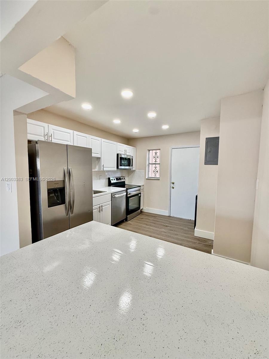 1950 West 54th Street, Unit 115 Hialeah, FL 33012 - Photo 12 of 28 a big room with closet and windows