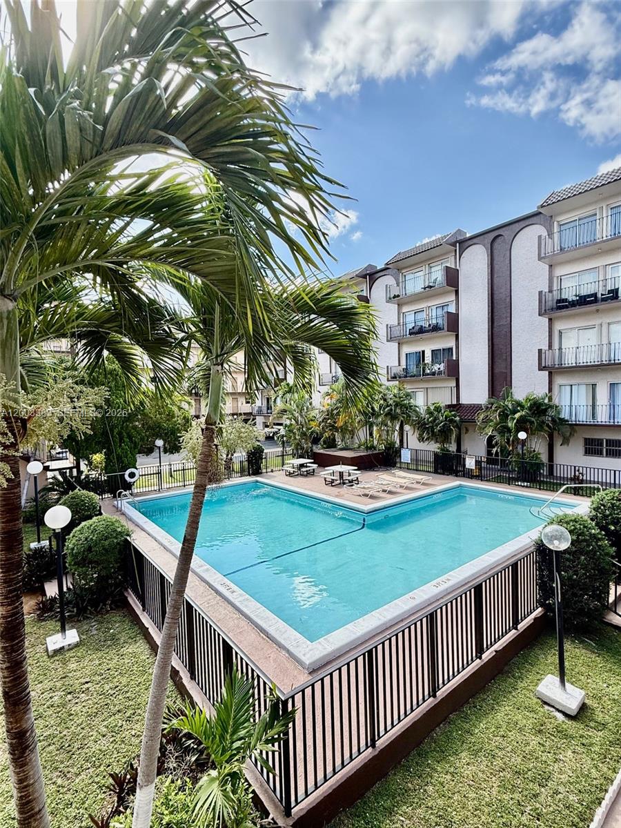 1950 West 54th Street, Unit 115 Hialeah, FL 33012 - Photo 25 of 28 a view of a backyard with sitting area