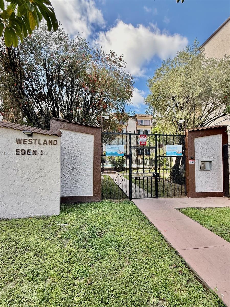 1950 West 54th Street, Unit 115 Hialeah, FL 33012 - Photo 3 of 28 a view of a backyard