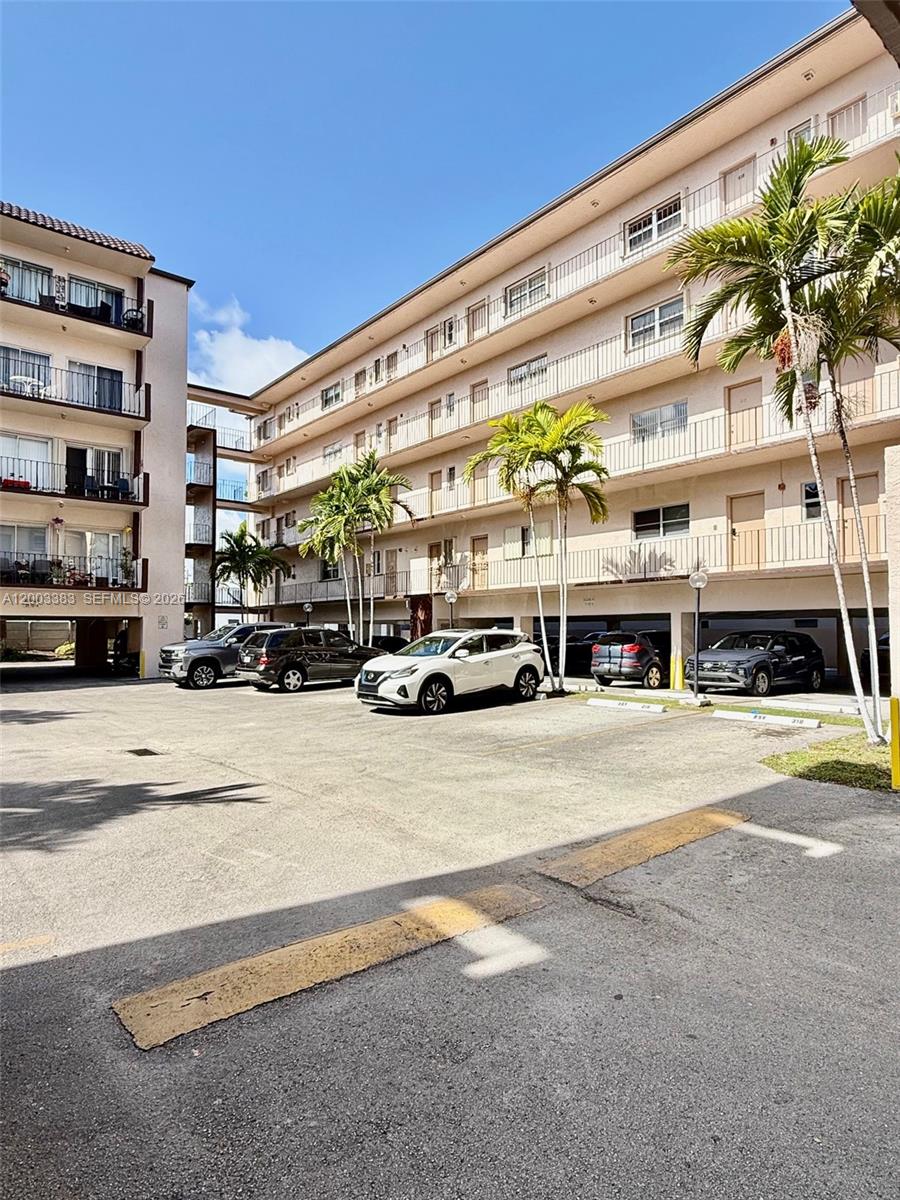 1950 West 54th Street, Unit 115 Hialeah, FL 33012 - Photo 5 of 28 a building exterior with the view of it