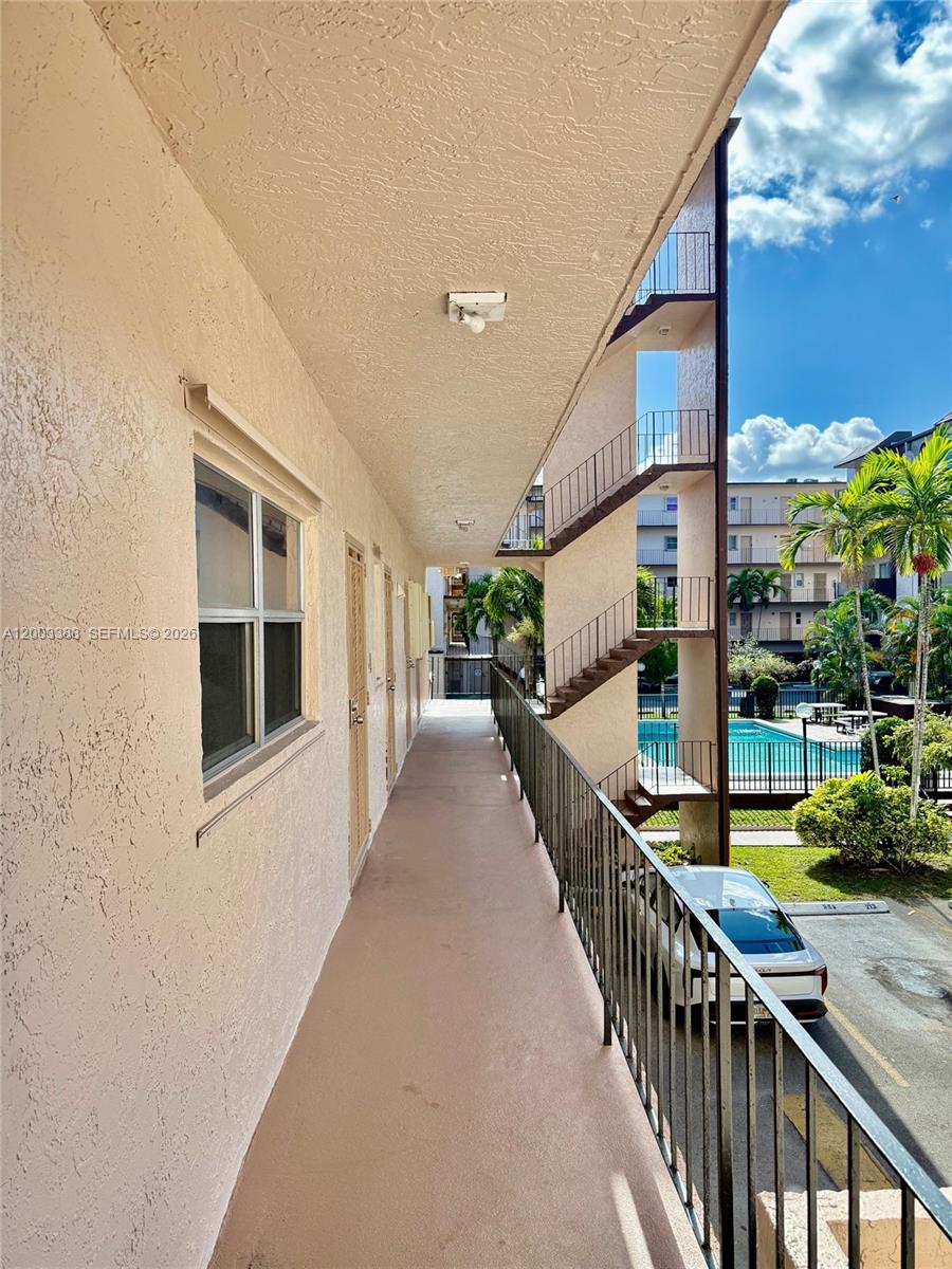 1950 West 54th Street, Unit 115 Hialeah, FL 33012 - Photo 6 of 28 a view of a balcony