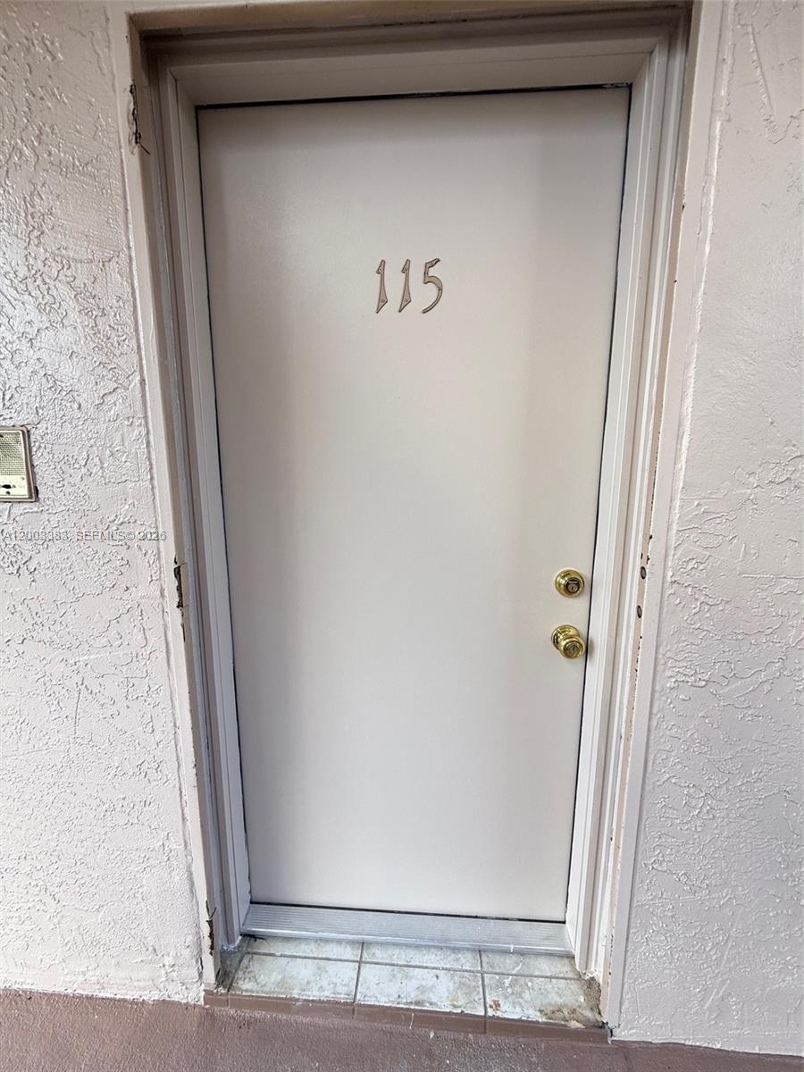 1950 West 54th Street, Unit 115 Hialeah, FL 33012 - Photo 8 of 28 a view of a door
