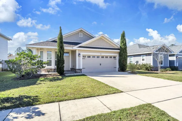 a view of a house with entertaining space