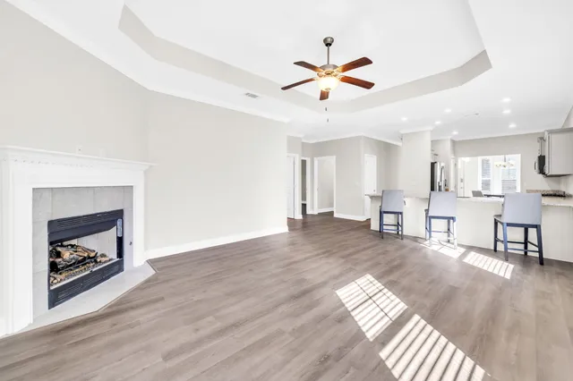 a view of livingroom and hardwood floor